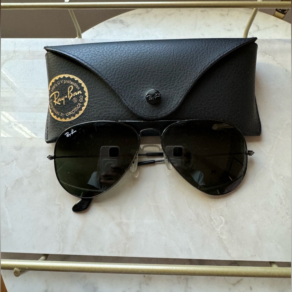 Black aviator style Ray Bans